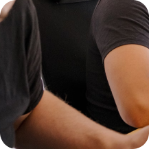 Close-up of a hand working on a laptop with Nexana.ai